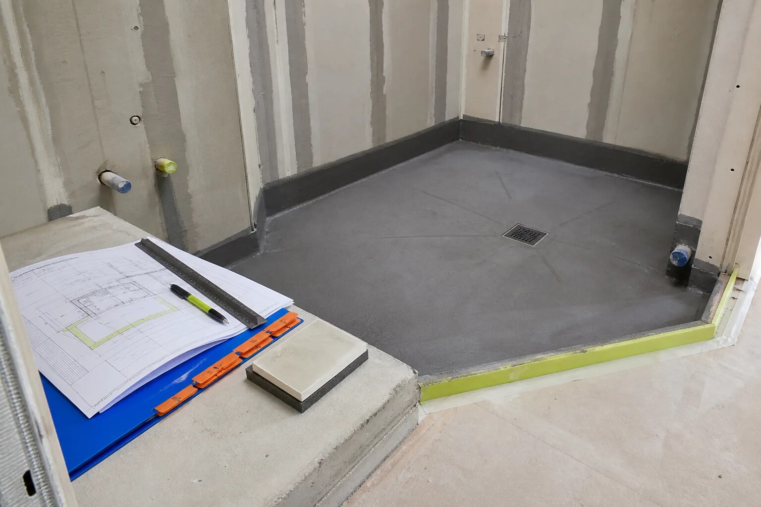 Apartment wet-area drawings with waterproofing and finish samples